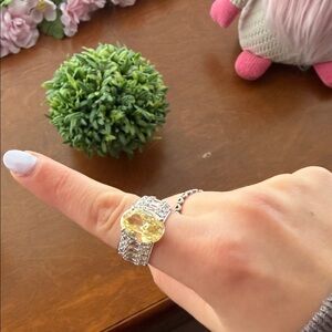 Radiant Silver Ring with Yellow Gemstone